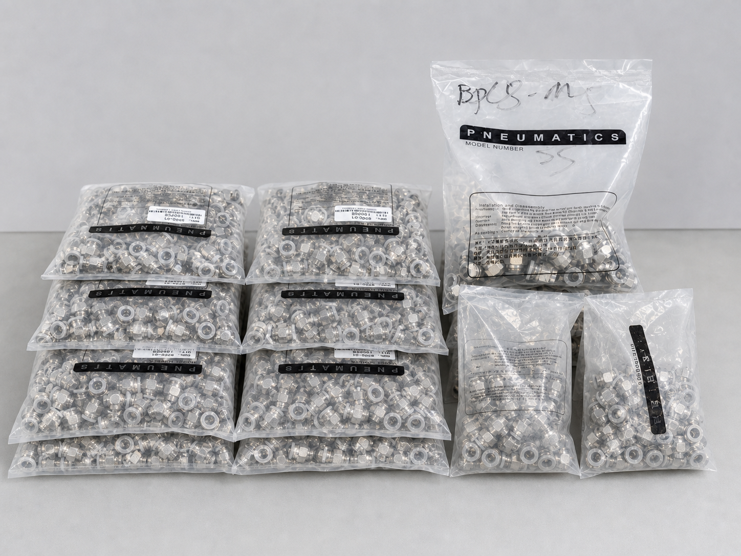 Organized bagged BPC pneumatic fitting inventory based on HOLID factory footage